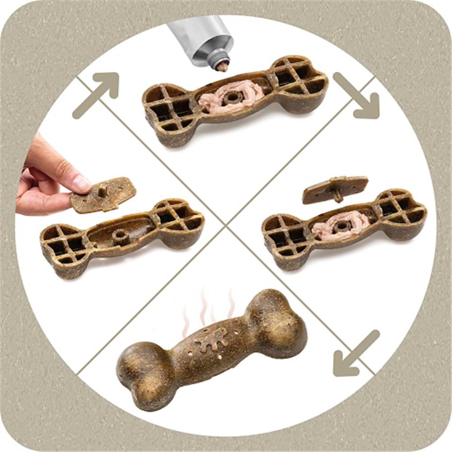 Dog treat mold being used to create bone-shaped treats with a hand holding one of the treats.