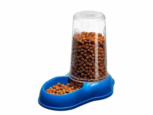 Pet food dispenser with blue base and transparent top containing dog food on a white background