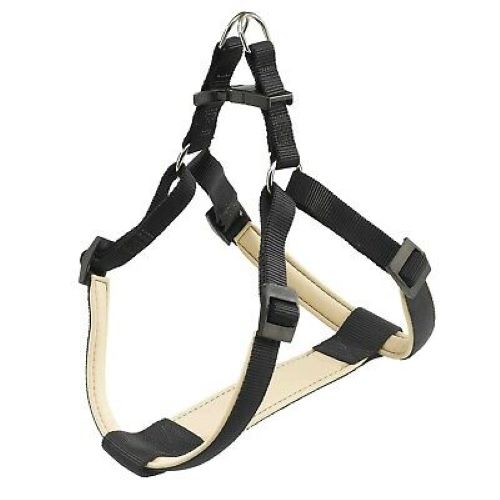 Black and beige dog harness on a white background