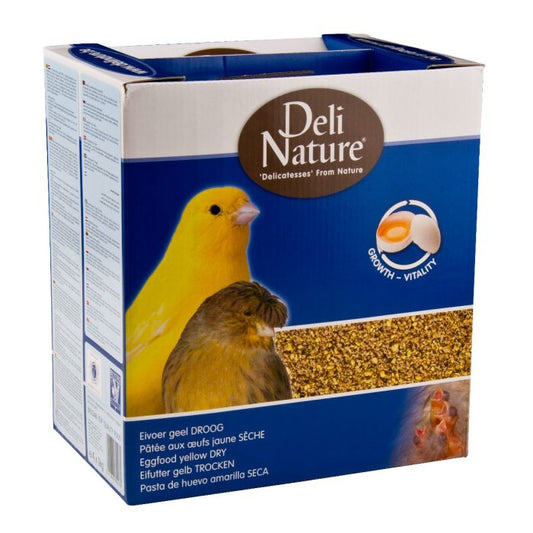 Deli Nature bird food packaging with a yellow bird illustration on a blue background