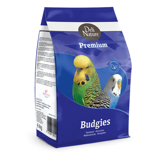 Blue package of Deli Nature Premium Budgies bird food with images of parakeets on a white background