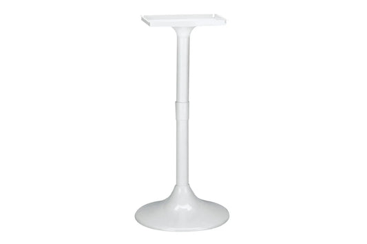 White pedestal table on a white background