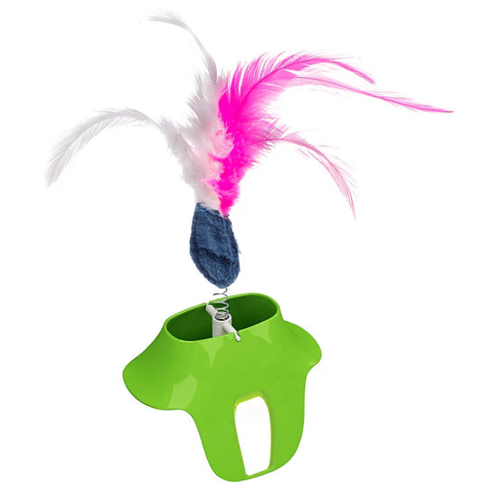 Green cat toy with feathers on a white background
