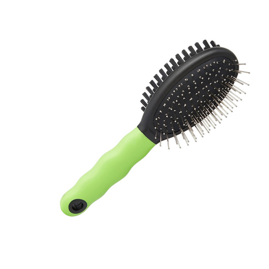 Green pet grooming brush with black bristles on a white background