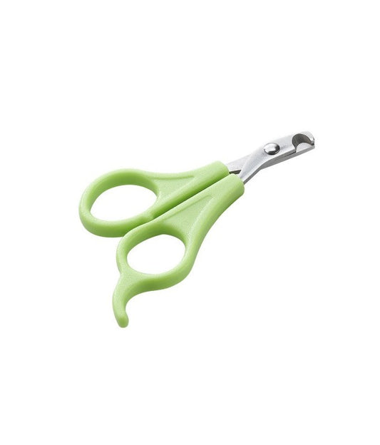 Green pet nail clippers on a white background