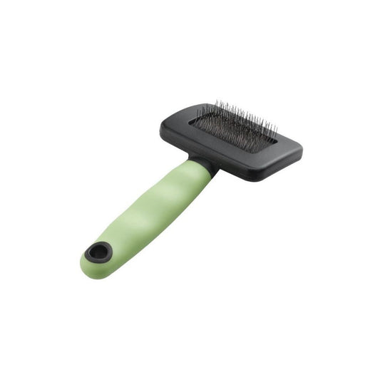 Pet grooming brush with green handle and black bristle head on a white background