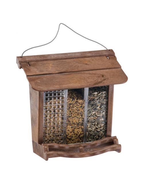 Wooden bird feeder with seeds on a white background
