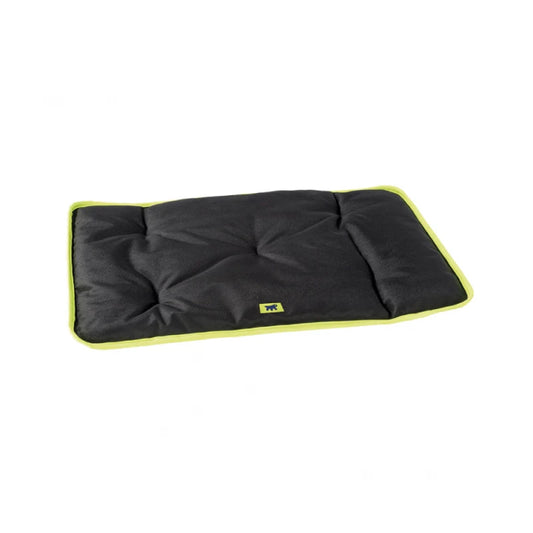 Black pet bed with green trim on a white background