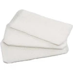 Three white towels stacked on top of each other